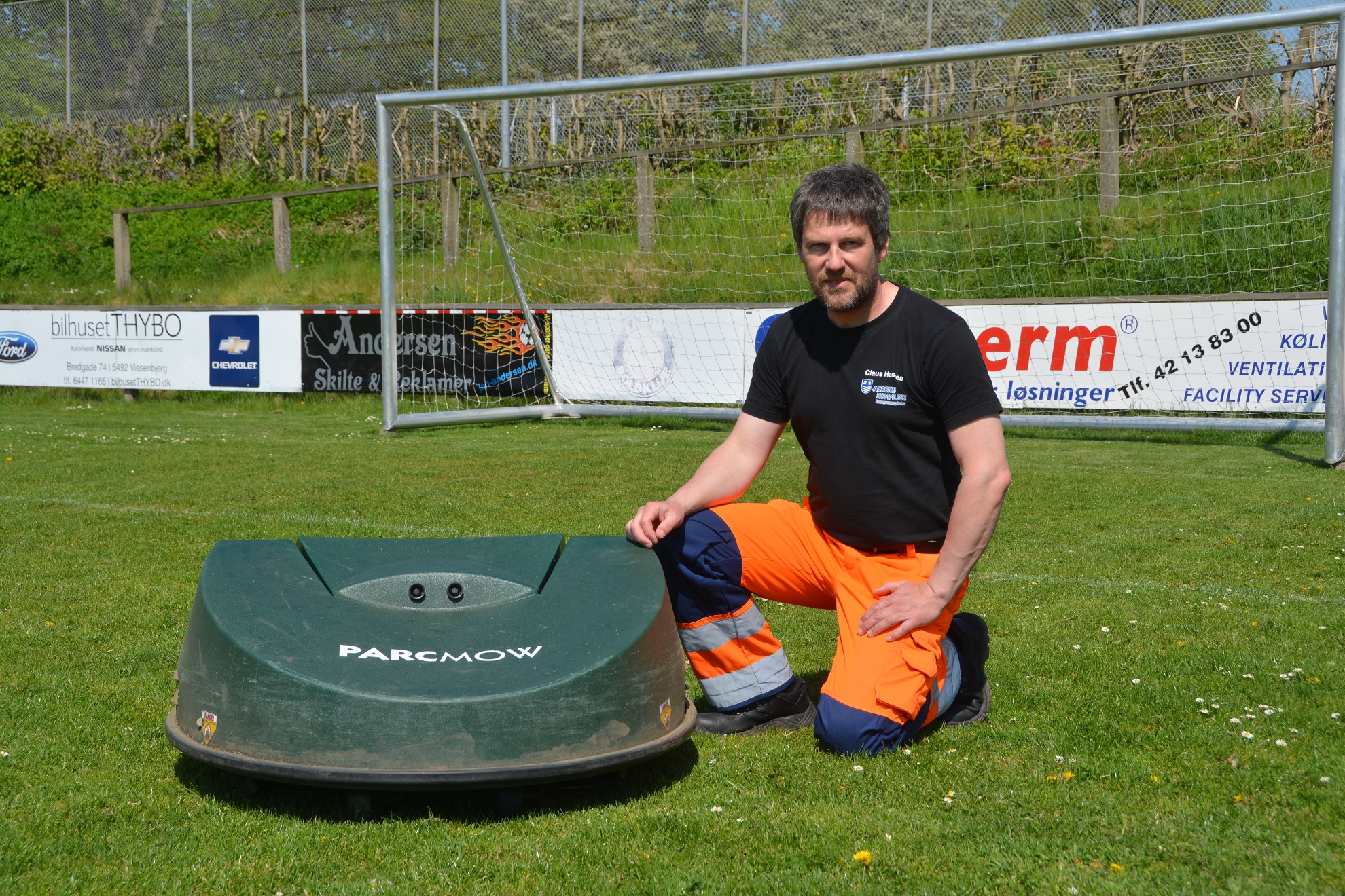 Professional robot mowers mow the town of Assens
